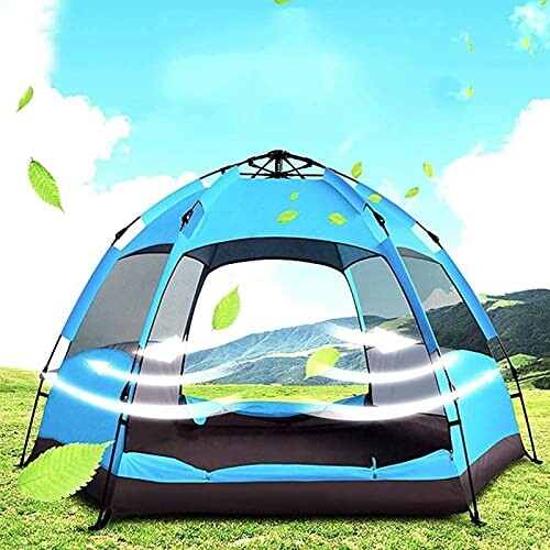 Blaues Zelt auf einer Wiese mit grünen Blättern im Hintergrund.