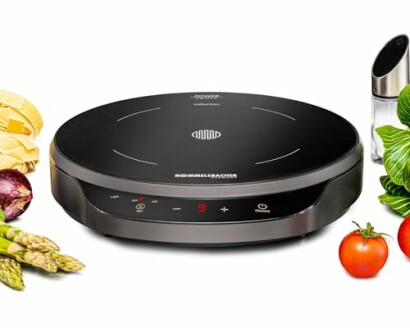 Tragbare Induktionskochplatte mit Gemüse